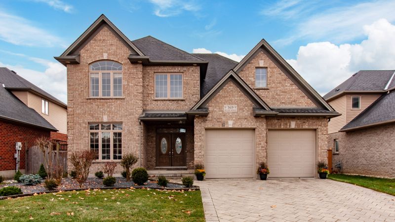 Finished HDR photo of a brick two-storey home