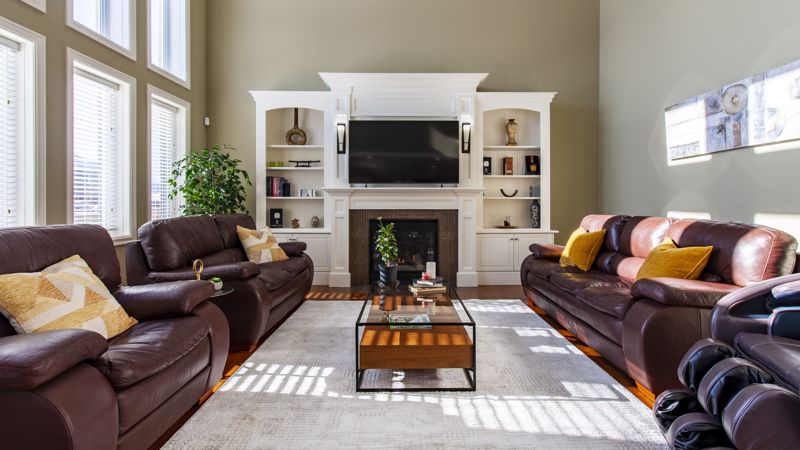 HDR interior photo of a living room with fireplace and built-ins